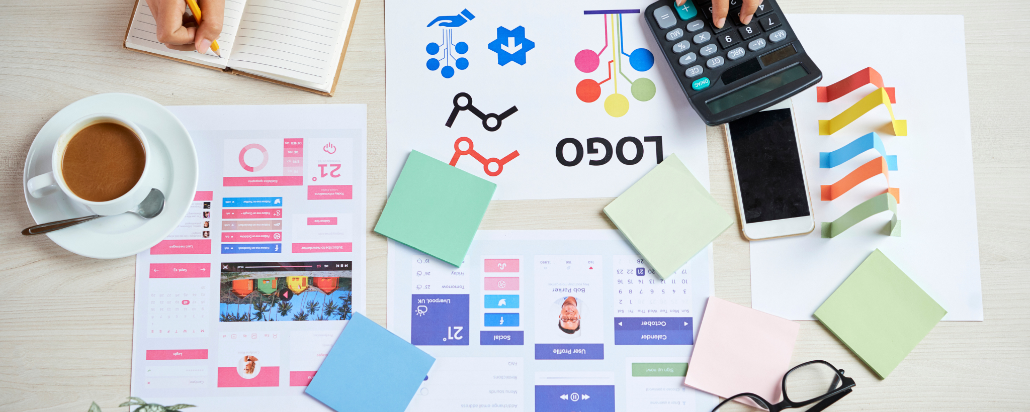 Desk with marketing materials and calculator