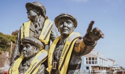 Statues wearing life jackets